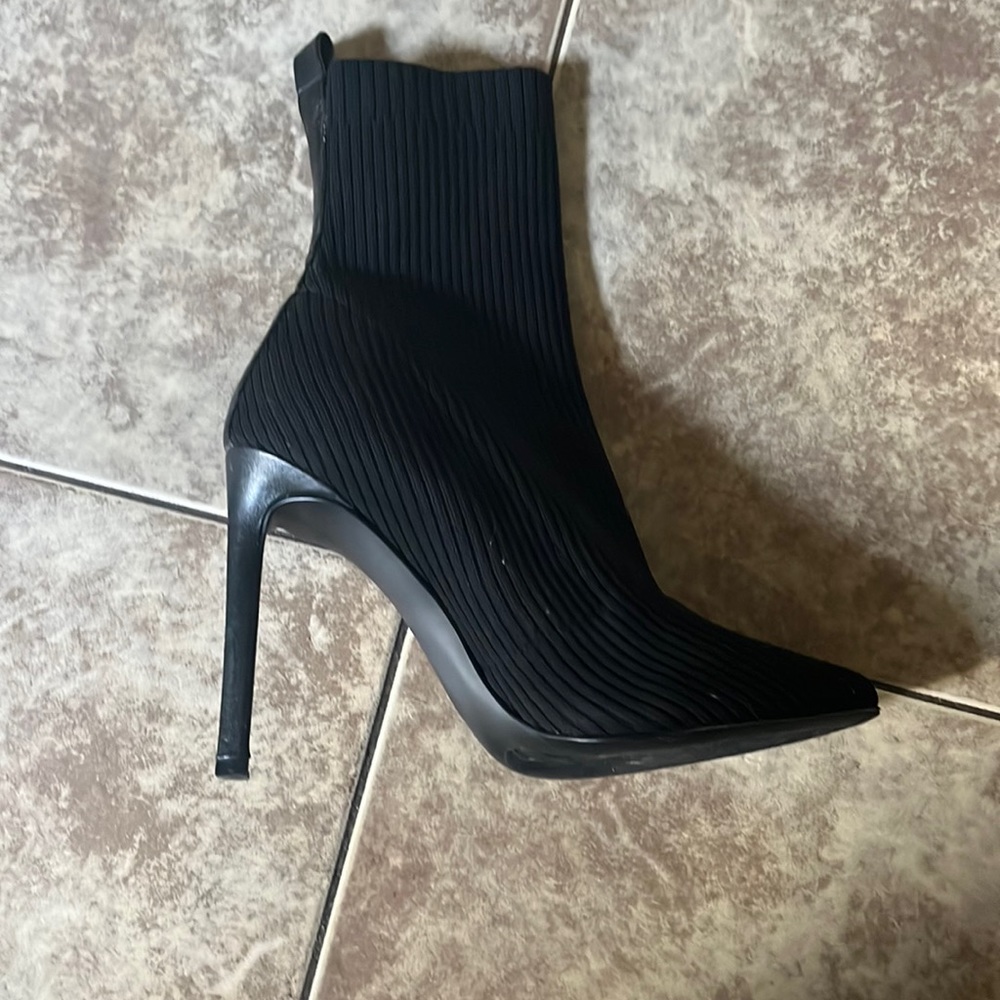 Black sleek pointed toe boots